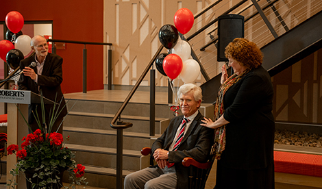 Dave Basinger sits at retirement celebration