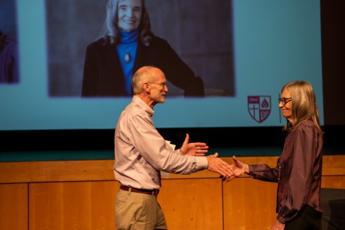 Doug Cullum and Elvera Berry shake hands