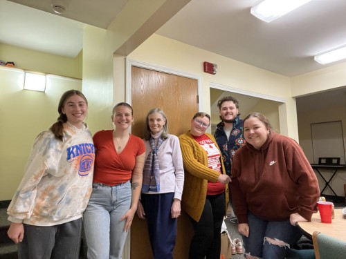 Hannah with friends and Dr. Berry at her townhouse.