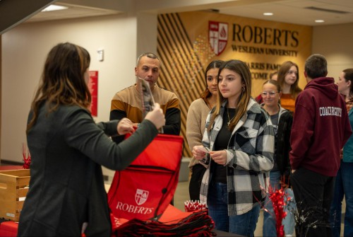 A student checks in at Discovery Day.