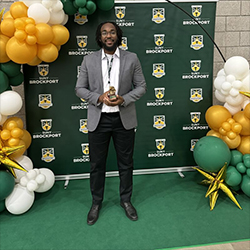 London Booker smiles with award