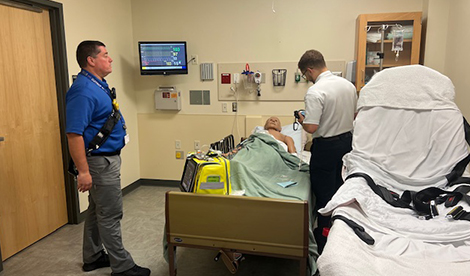 2 healthcare workers work in the simulation center