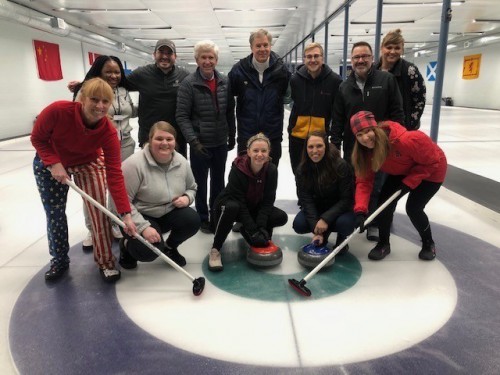 Sam and her teammates curling