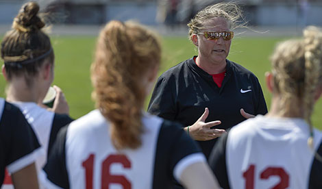 Coach McClellan speaks to her team.