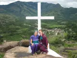 Tina on top of a beautiful mountain in Kerala